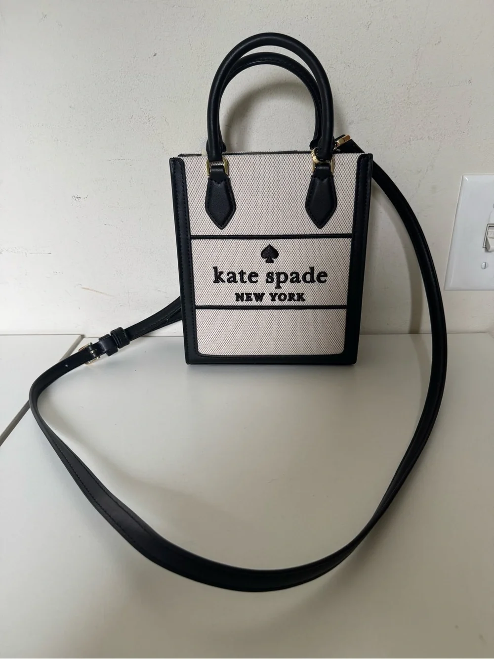 kate spade Ellie Mini Black Leather Cream Structured Canvas Crossbody Tote